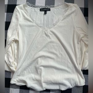 White/egg shell body suit long sleeve. Size L runs small